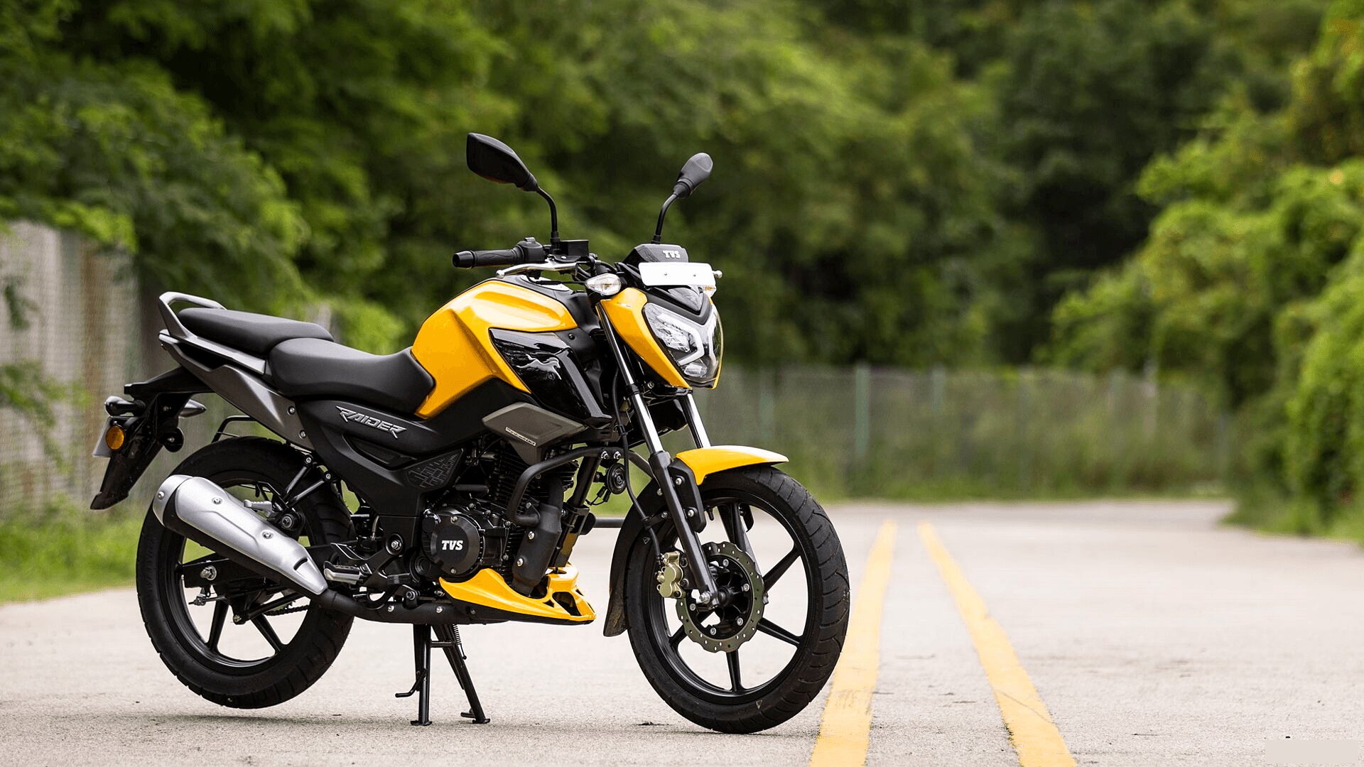 tv raider 125 cc yellow side look